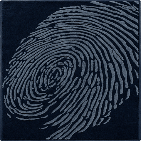 Whorl Indigo Rug - hand-tufted abstract wool rug with blue, cobalt and navy whorl pattern
