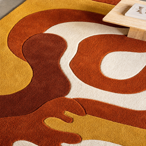 Retro Wave modern hand-tufted rug in coral, orange, and white with 80s-inspired wave pattern