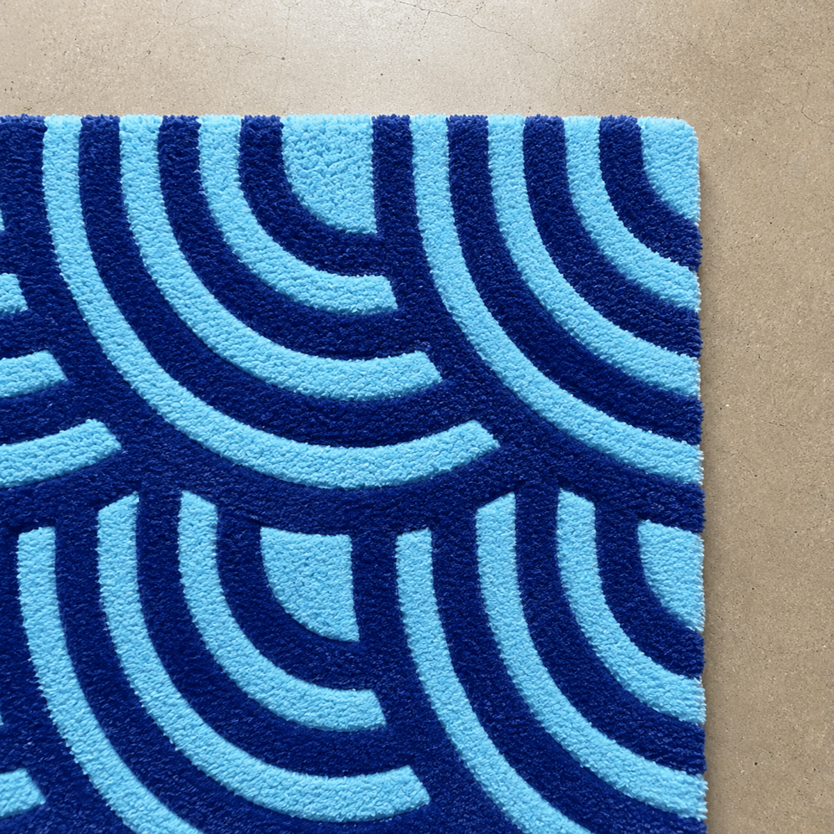 Nami-Do Rug - Hand-tufted modern rug in blue, cream, and peach - ThePieCraft