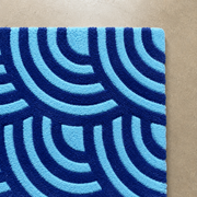 Nami-Do Rug - Hand-tufted modern rug in blue, cream, and peach - ThePieCraft