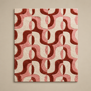 Sienna Swirl abstract hand-tufted rug in cream, peach, and white with warm swirling patterns
