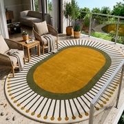 Solstic Oval modern hand-tufted rug in orange, white, and yellow with sunny solstice-inspired design