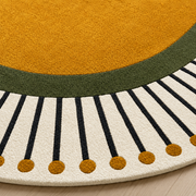 Solstic Oval modern hand-tufted rug in orange, white, and yellow with sunny solstice-inspired design