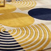 Arco Concentric Rug with mustard navy and yellow concentric arcs - hand-tufted geometric wool rug